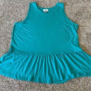 bunch of t-shirts and tanks